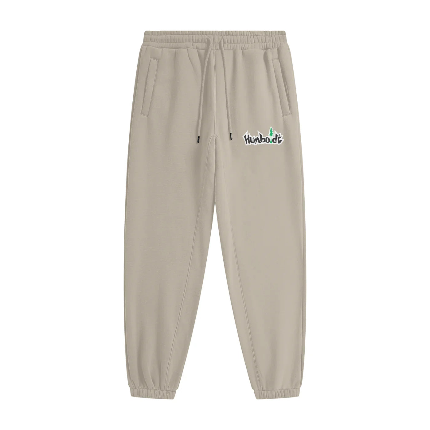 Beige joggers with Humboldt logo, featuring drawstring waist and side pockets, ideal for casual or outdoor wear.