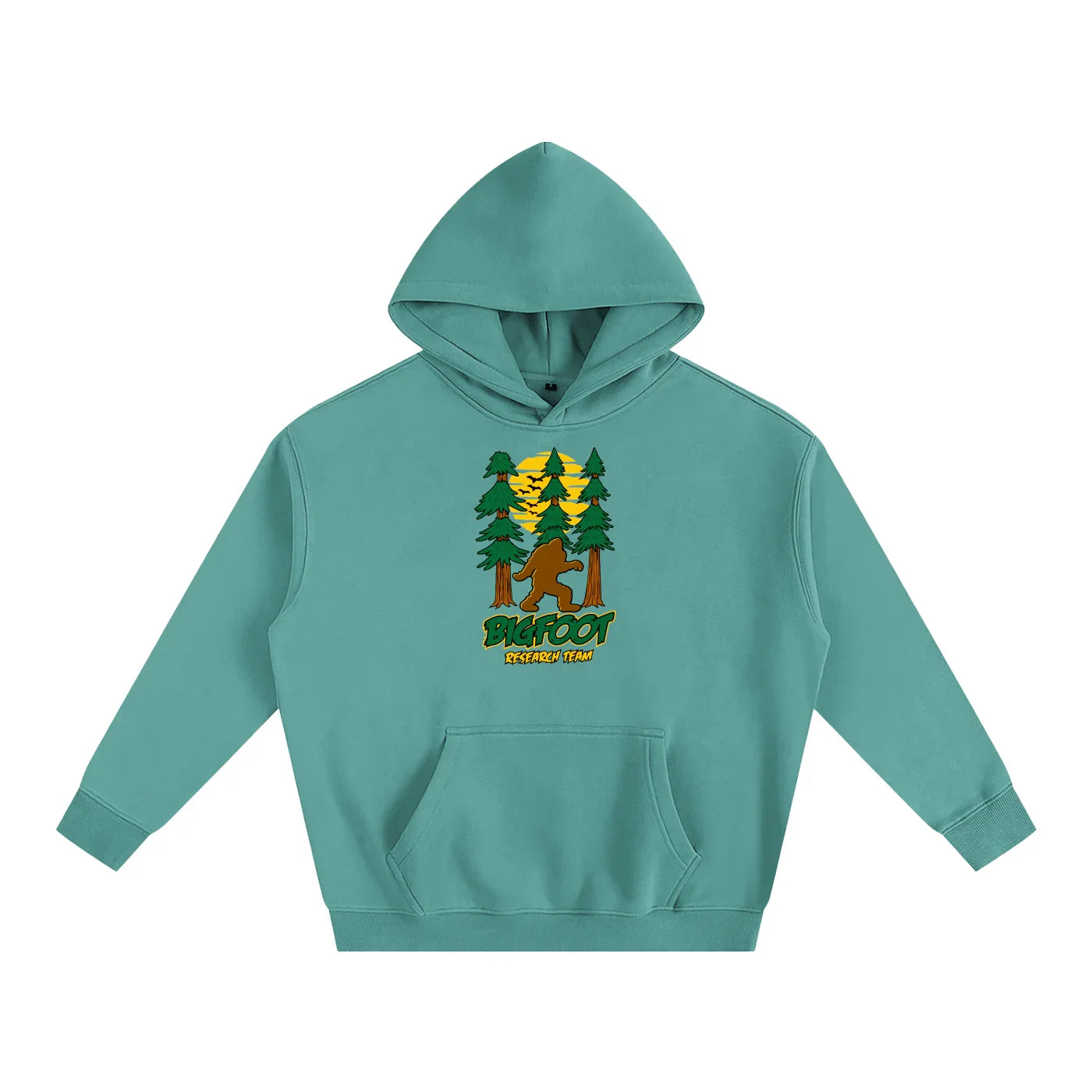 Teal hoodie with Bigfoot graphic, forest design, and 'Bigfoot Research Team' text for outdoor streetwear style.