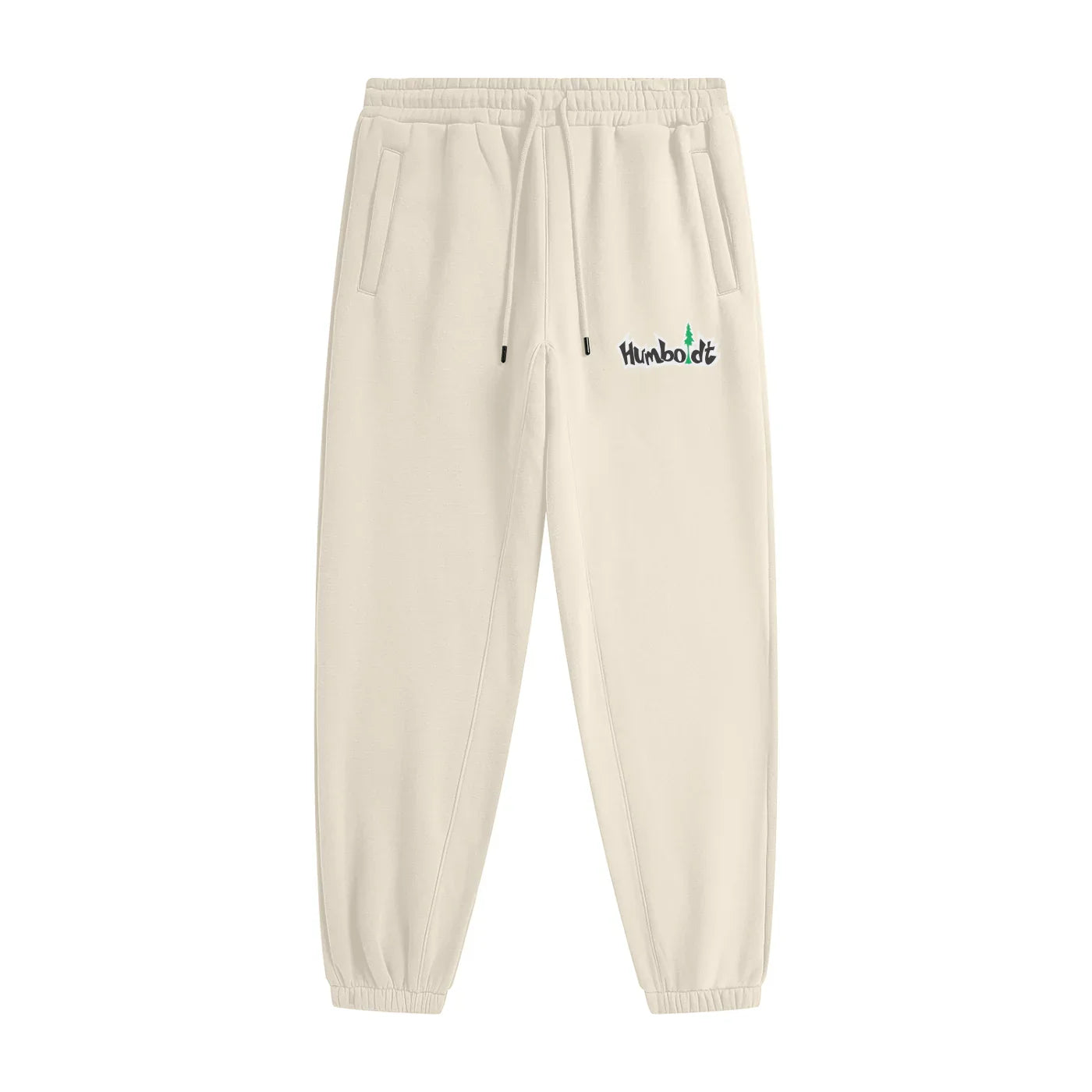 Cream Humboldt joggers with tree logo, relaxed fit, drawstring waist, side pockets, casual streetwear style