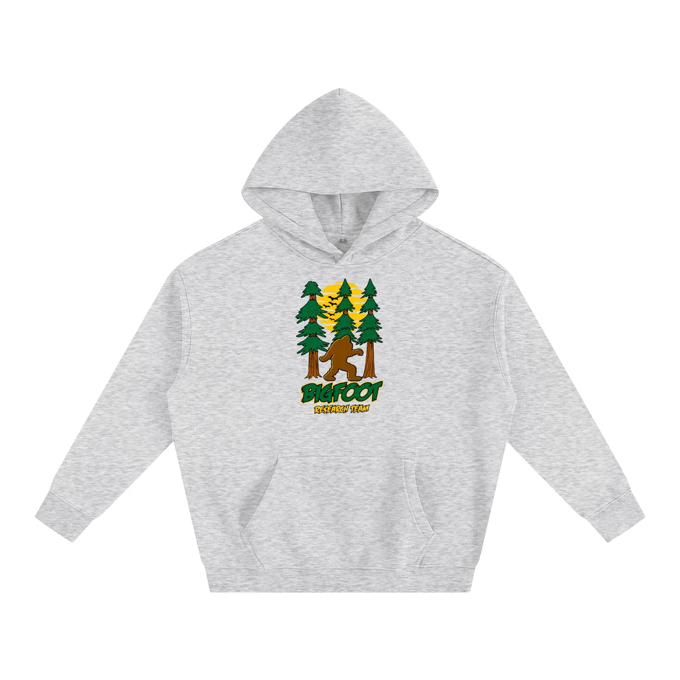 Gray hoodie with Bigfoot graphic, forest scene, and 'Bigfoot Research Team' text, blending outdoor and streetwear style.