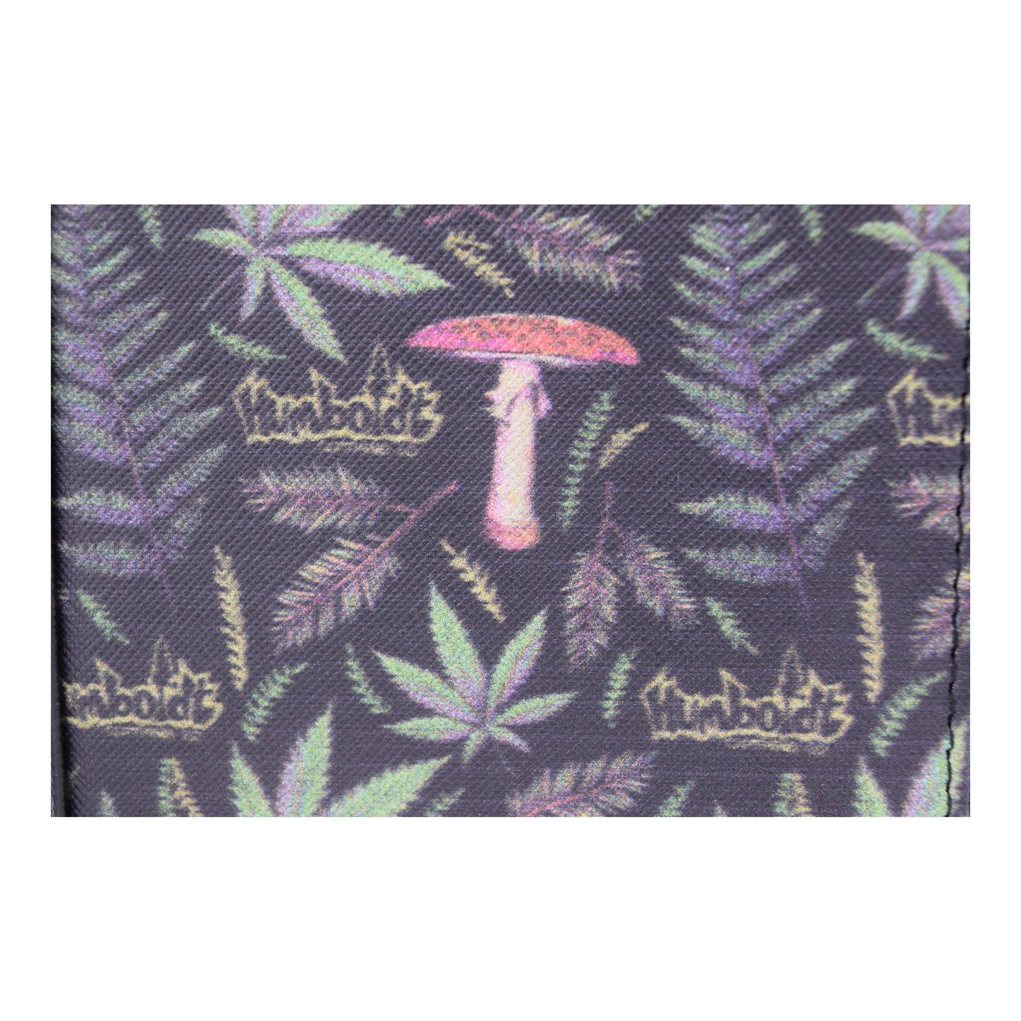 Dark fabric with neon cannabis leaves, ferns, and a pink mushroom, featuring 'Humboldt' text in yellow.