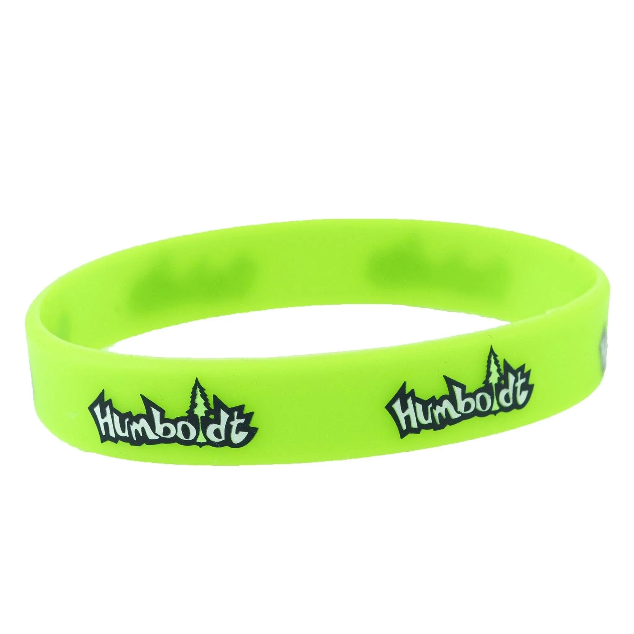 Neon green silicone wristband with 'Humboldt' logo and tree design, outdoor accessory for Northern California style